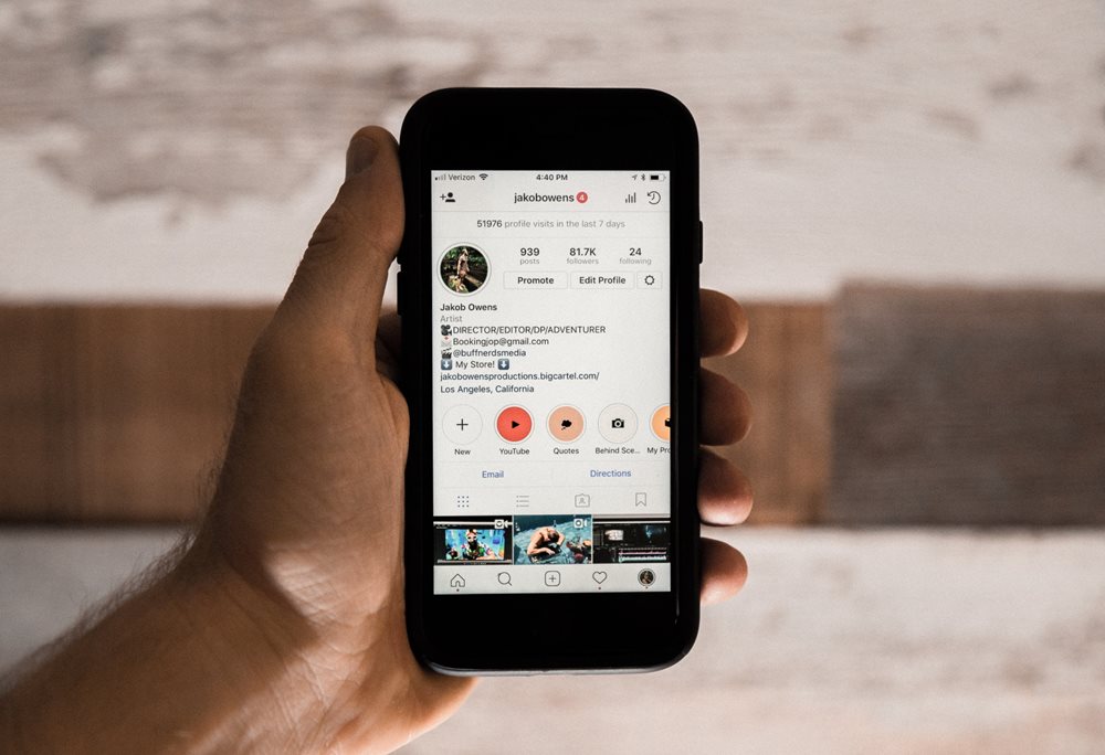 Smartphone with Instagram profile bio showing.