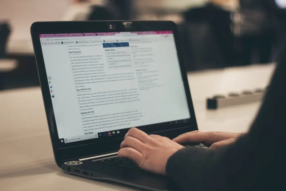 Person working on a laptop.