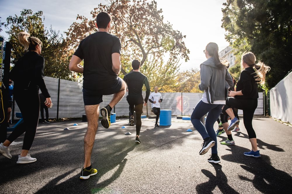 Group of people doing outdoor exercise.