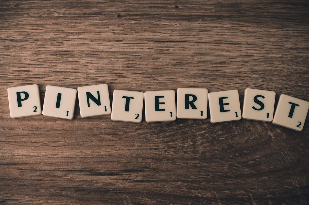 "Pinterest" spelled with Scrabble blocks.